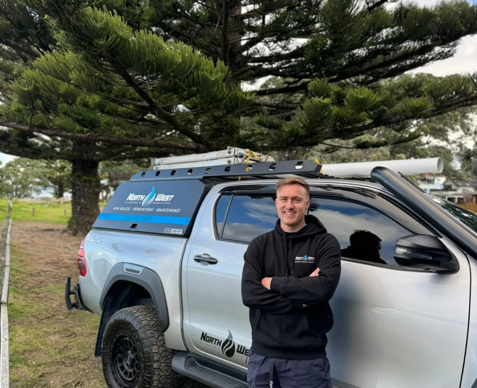 Ben, a licensed plumber based in West Auckland, in his workshop
